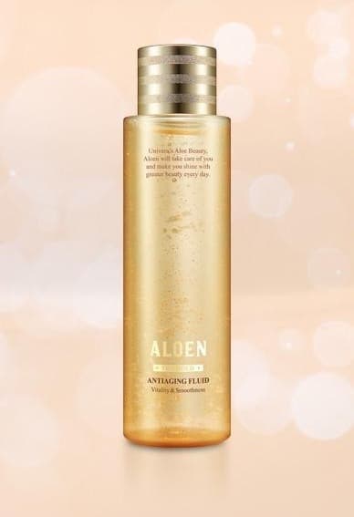 알로엔 안티에이징 플루이드 200ml 용기와 바닥에 비친 그림자. 용기 글자: Univera's Aloe Beauty, Aloen will take care of you and make you shine with greater beauty every day., ALOEN, THE GOLD, ANTIAGING FLUID, Vitality & Smoothness